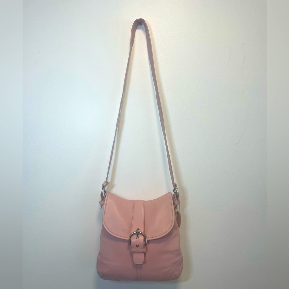 Pink leather coach crossbody bag
